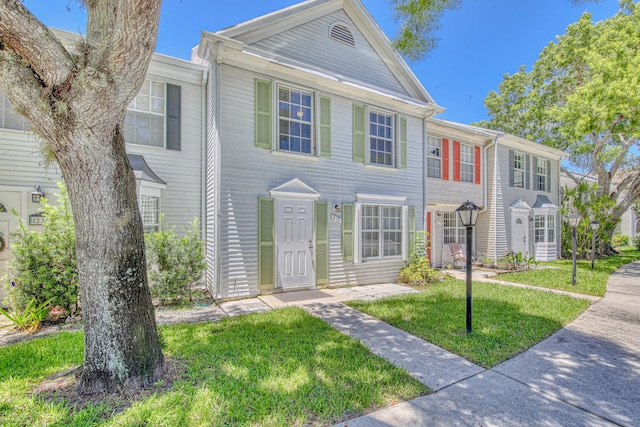 view of property with a front yard