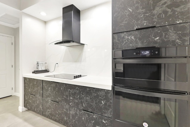 kitchen with exhaust hood, backsplash, black electric cooktop, light tile patterned floors, and double oven