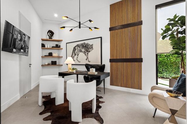 dining area with a chandelier and plenty of natural light