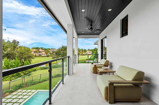 balcony featuring ceiling fan