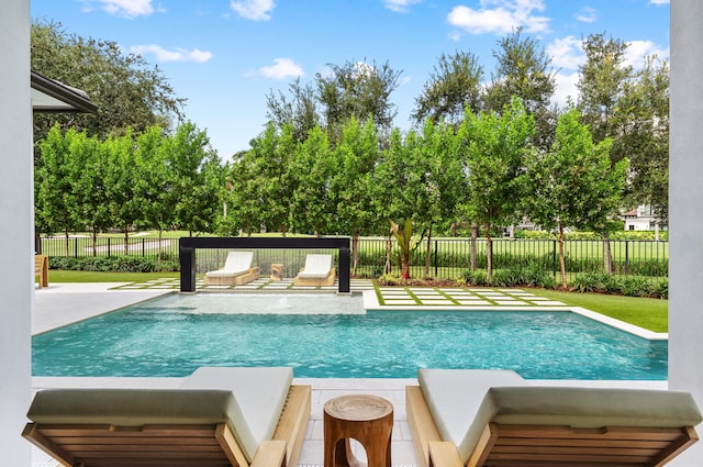 view of swimming pool featuring a patio area