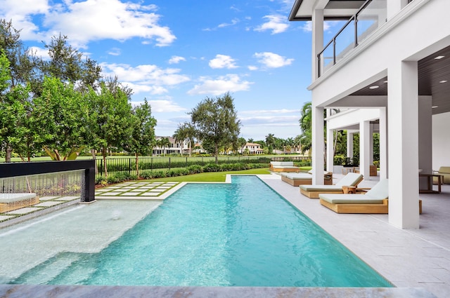 view of pool with a patio area