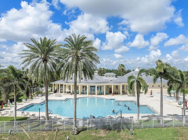 view of swimming pool with a patio area