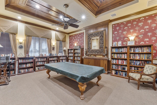 game room with crown molding, carpet floors, and a raised ceiling