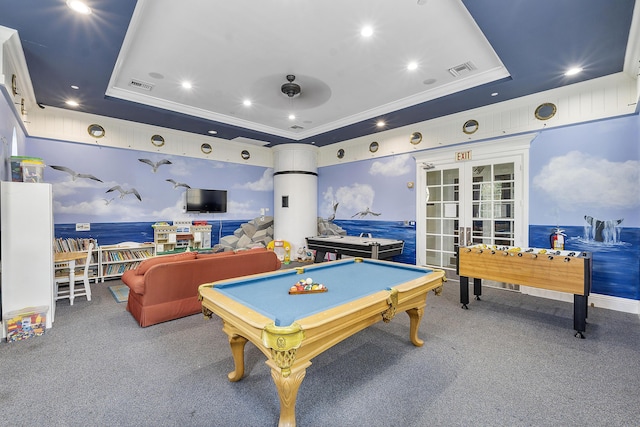 playroom featuring french doors, crown molding, carpet, and a tray ceiling