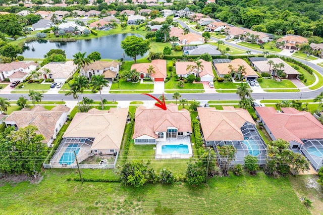 drone / aerial view with a water view