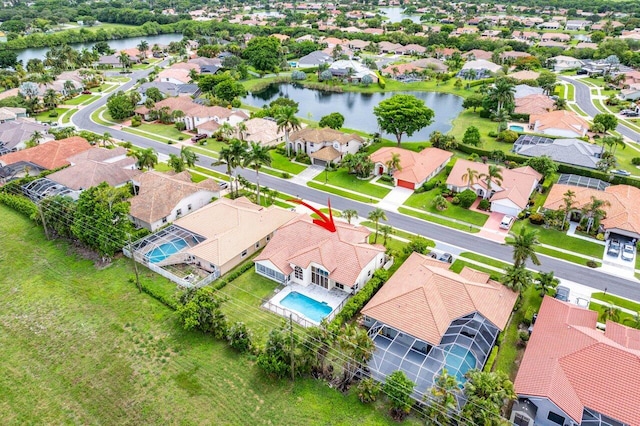 drone / aerial view with a water view