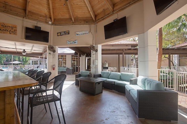 view of patio / terrace featuring ceiling fan, a gazebo, and outdoor lounge area