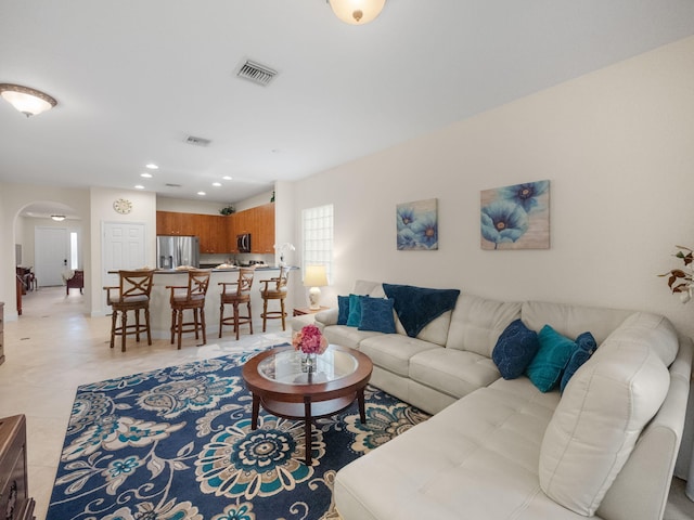 living room featuring light tile patterned flooring