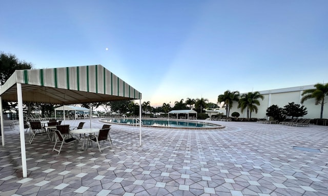 view of pool featuring a gazebo and a patio area