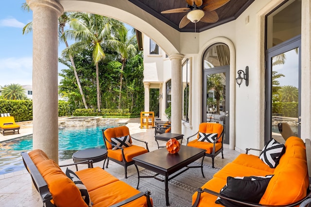 view of patio featuring an outdoor living space and ceiling fan