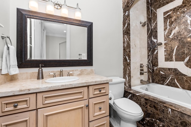 full bathroom featuring tiled shower / bath combo, crown molding, toilet, and vanity