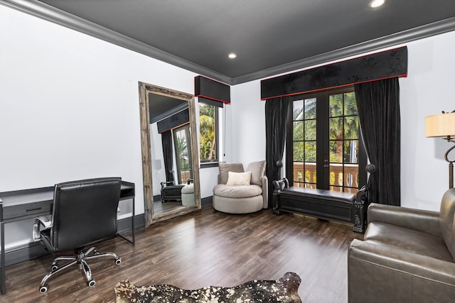 office with ornamental molding, dark hardwood / wood-style floors, french doors, and a wealth of natural light