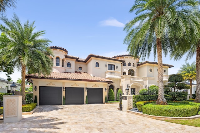 mediterranean / spanish house featuring a garage