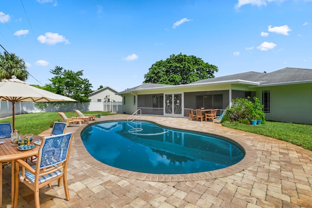 view of swimming pool featuring a fenced in pool, a sunroom, a fenced backyard, outdoor dining area, and a patio area