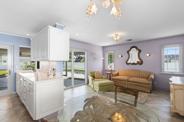 living area with light tile patterned floors, recessed lighting, visible vents, baseboards, and ornamental molding