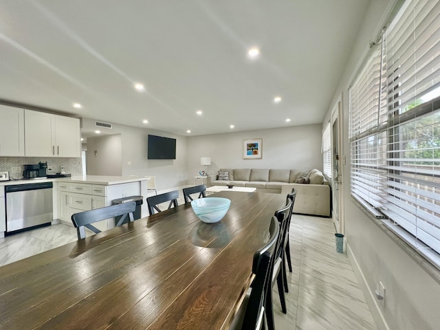 dining area featuring marble finish floor, visible vents, baseboards, and recessed lighting