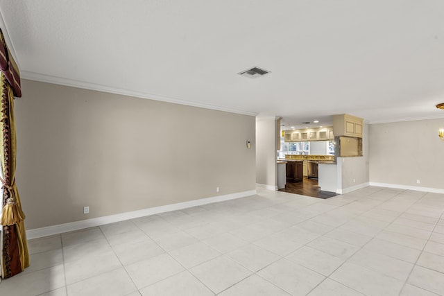 unfurnished living room with crown molding