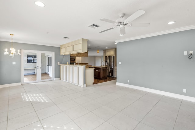 interior space featuring light tile patterned floors, crown molding, and ceiling fan with notable chandelier