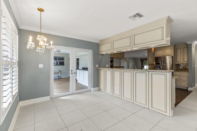 kitchen featuring stainless steel refrigerator with ice dispenser, kitchen peninsula, crown molding, and cream cabinetry