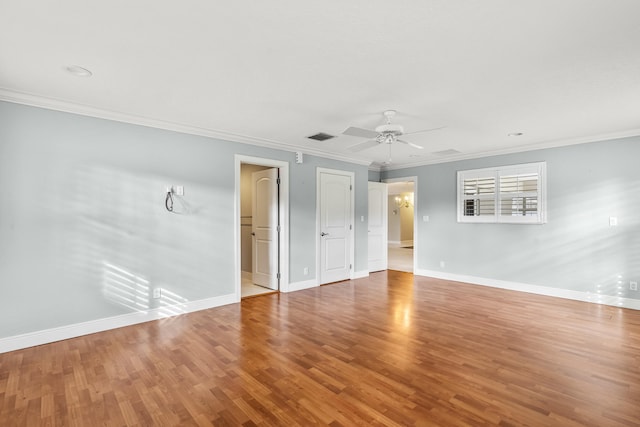 unfurnished room with ceiling fan, ornamental molding, and light wood-type flooring