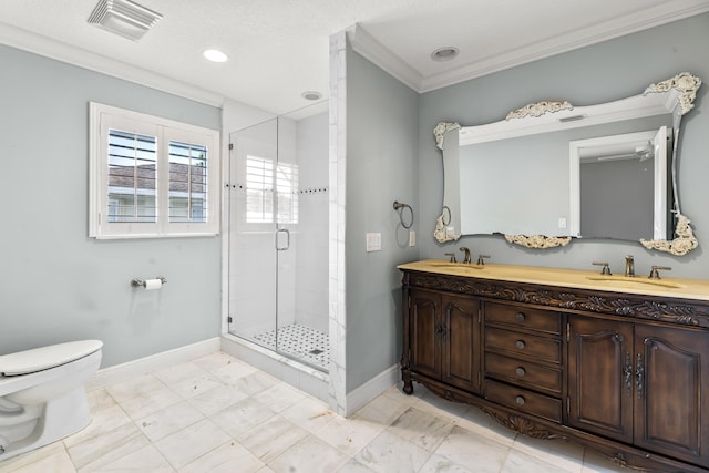 bathroom with vanity, a shower with shower door, ornamental molding, and toilet