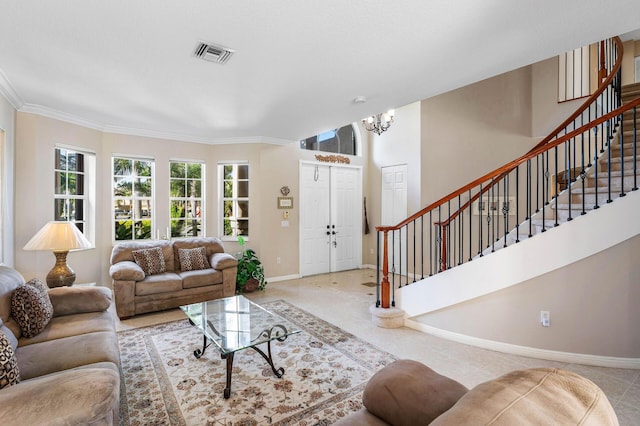 living area with visible vents, baseboards, stairs, ornamental molding, and an inviting chandelier