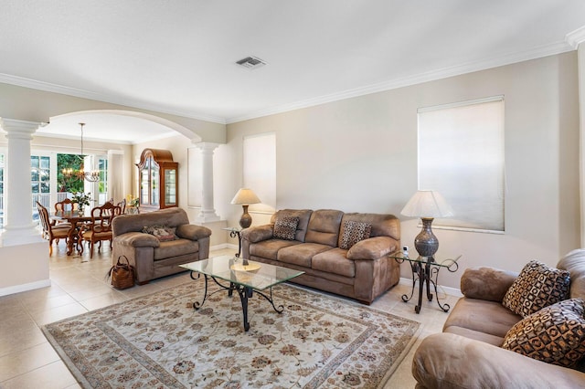 living room featuring visible vents, crown molding, decorative columns, arched walkways, and light tile patterned floors