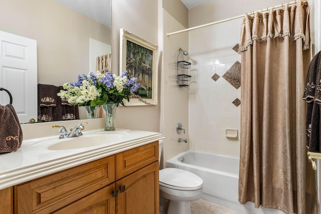bathroom with toilet, vanity, and shower / bath combination