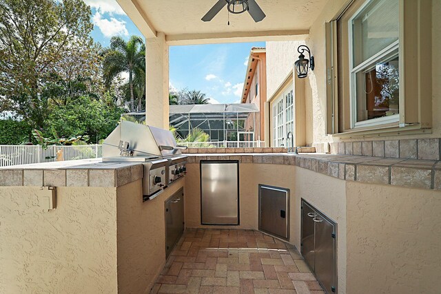 garage with water heater, ceiling fan, and a garage door opener