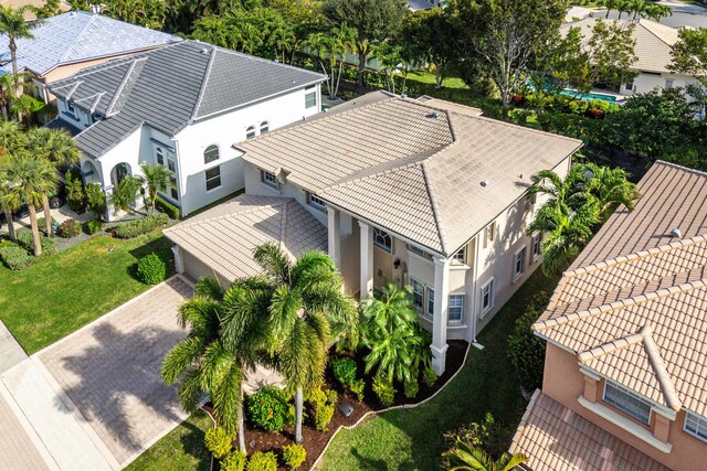 drone / aerial view with a water view and a residential view