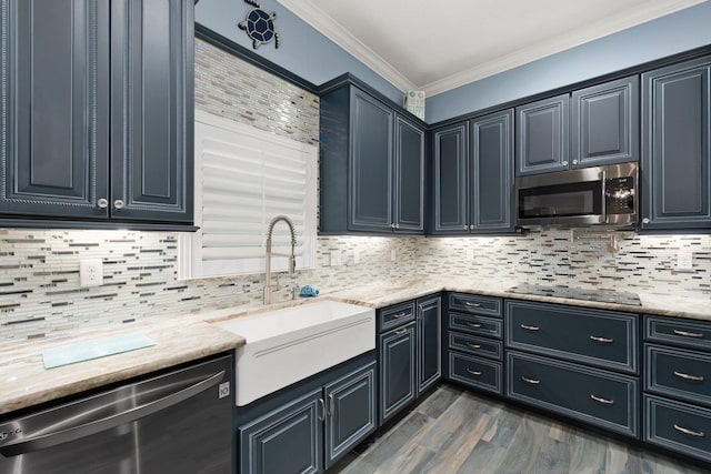 kitchen with decorative backsplash, appliances with stainless steel finishes, light stone counters, dark wood-type flooring, and sink