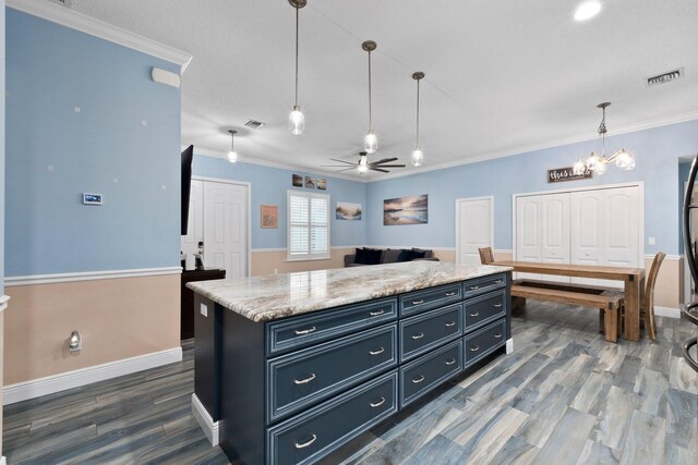 bedroom with a tray ceiling, ceiling fan, light colored carpet, and a textured ceiling