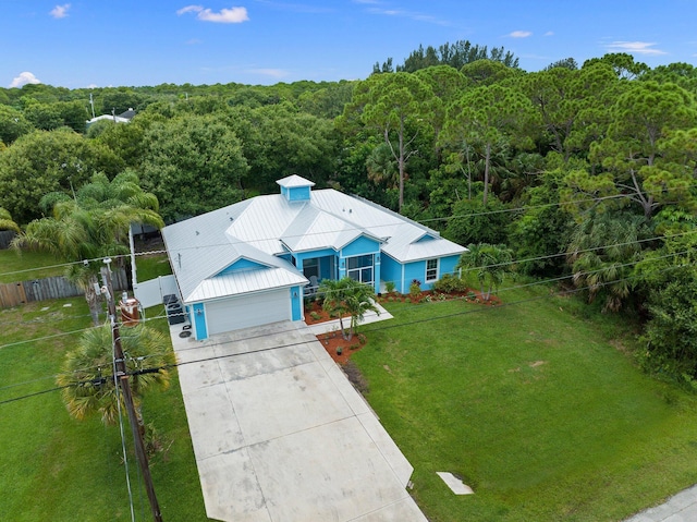 5713 Myrtle Dr, Fort Pierce, FL 34982 - view from above of property featuring a forest