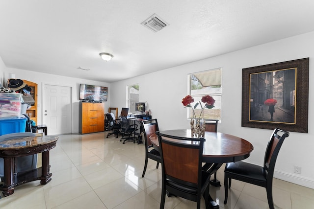 view of tiled dining room