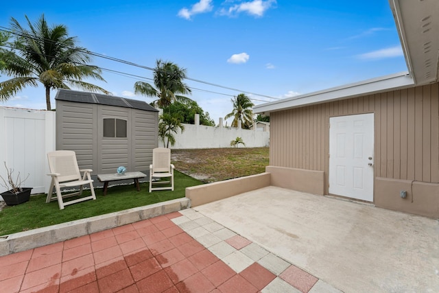 view of patio / terrace with a storage unit