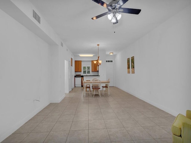 dining room featuring ceiling fan and light tile patterned floors