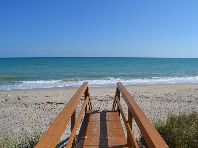 view of water feature with a beach view