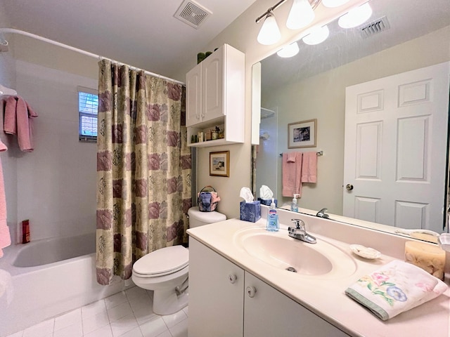 full bathroom with tile patterned floors, vanity, toilet, and shower / bath combo