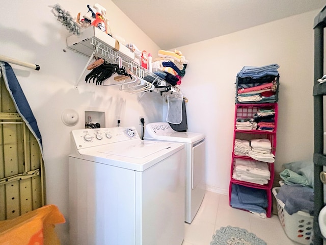 laundry room featuring washing machine and clothes dryer