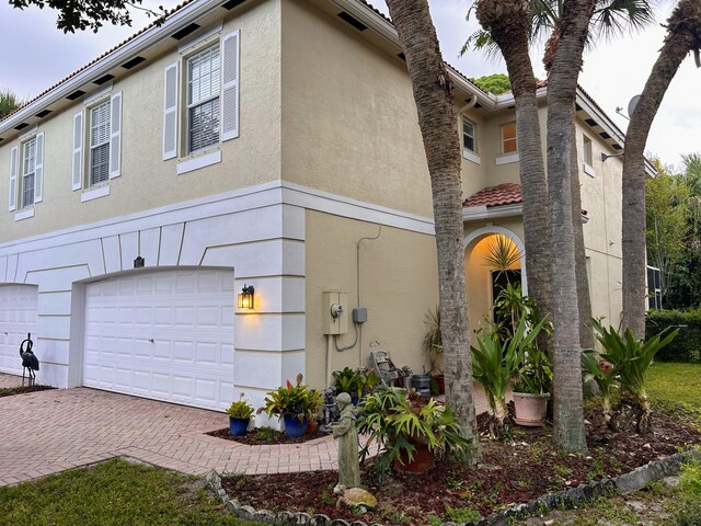 view of front of home with a garage