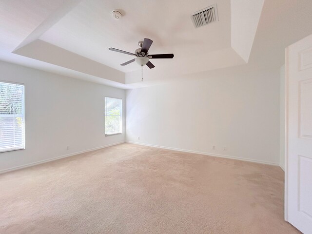 bedroom featuring light carpet and ceiling fan