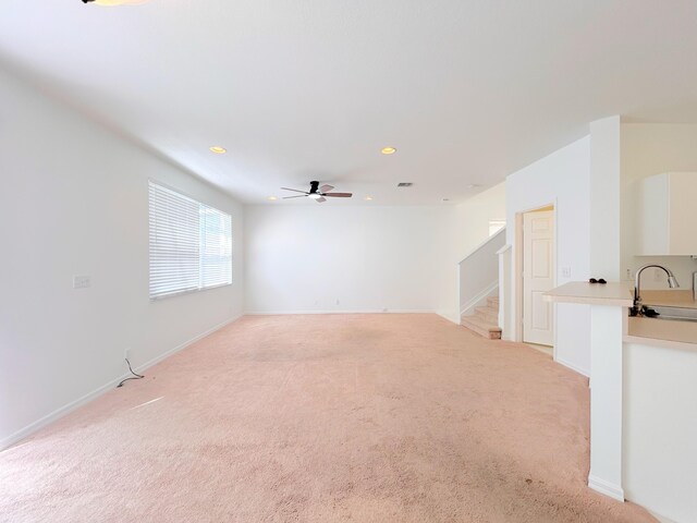 staircase featuring light tile patterned flooring and a wealth of natural light