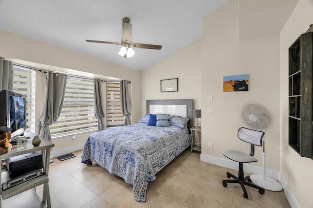 tiled bedroom featuring vaulted ceiling and ceiling fan