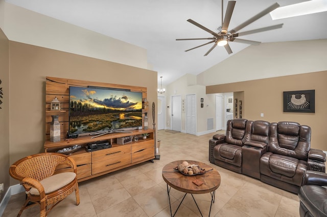 living room with light tile patterned floors, vaulted ceiling, and ceiling fan