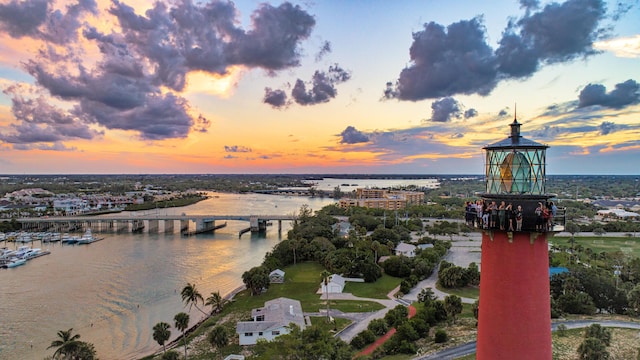 aerial view at dusk with a water view