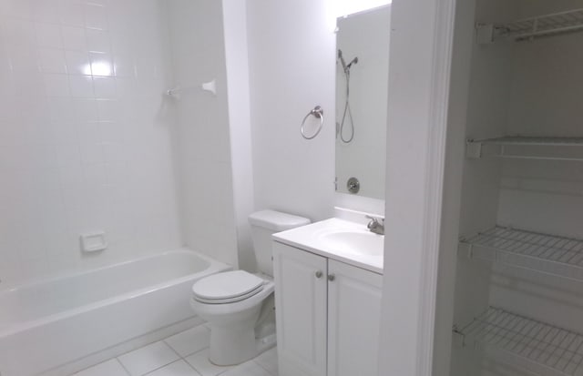 full bathroom with vanity, tile patterned floors, shower / bathtub combination, and toilet