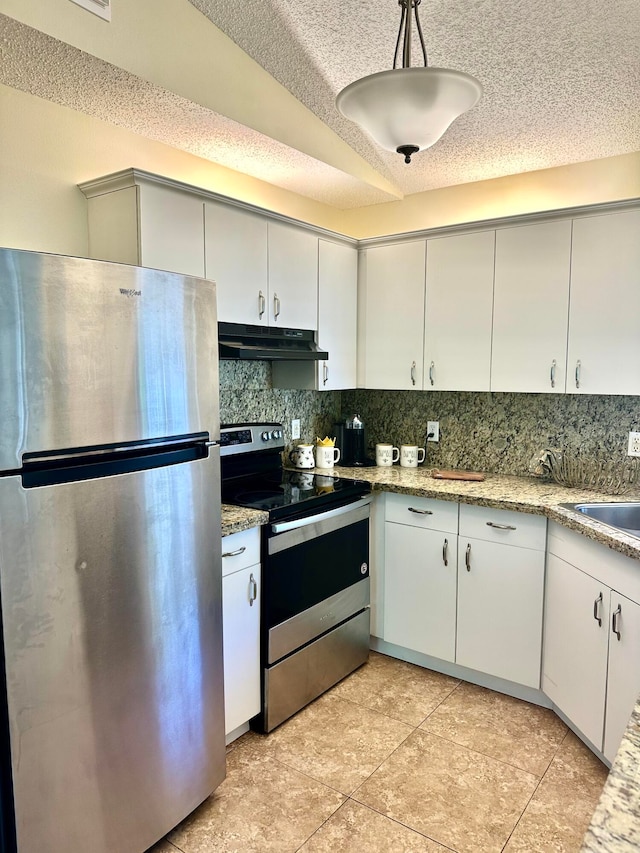 kitchen featuring backsplash, hanging light fixtures, white cabinets, and stainless steel appliances