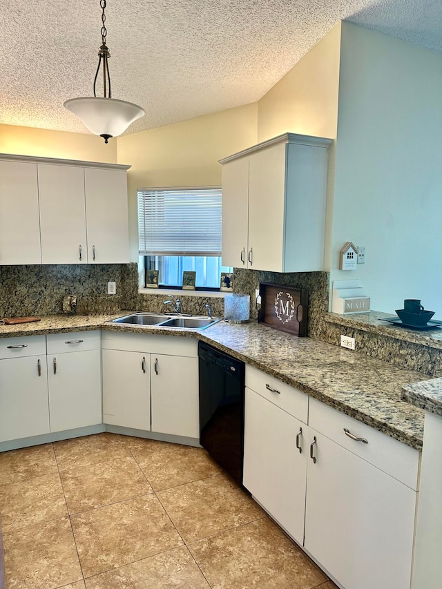 kitchen featuring black dishwasher, a textured ceiling, sink, decorative light fixtures, and white cabinets