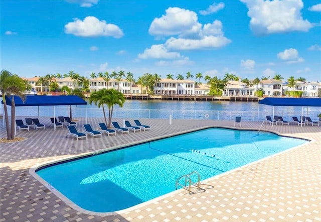 view of swimming pool with a patio